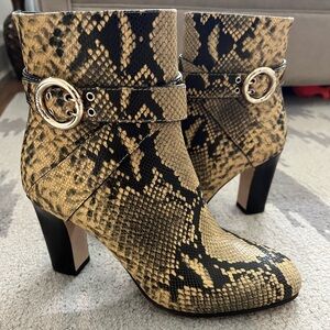 Jimmy Choo- Booties, snake like pattern. With gold hardware and zippers size 39.